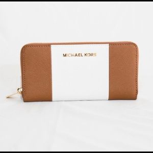 brown and white michael kors wallet